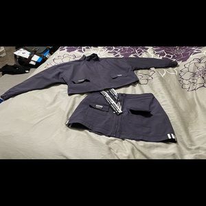 Adidas women crop jacket and skirt.